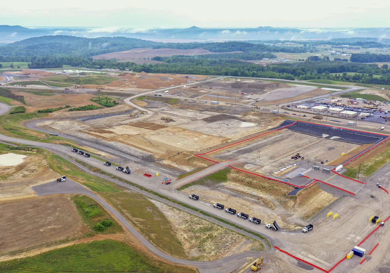 Aerial view of the OSWDF operations including waste placement and Cell 4 construction.